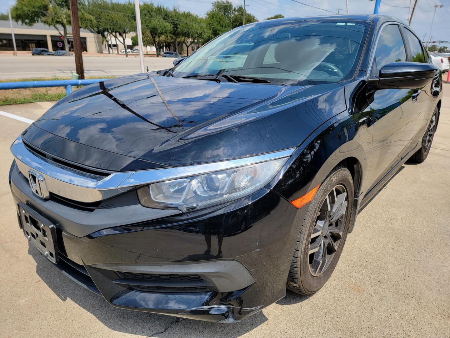 2016 Black Honda Civic LX Sedan CVT (19XFC2F51GE) with an 2.0L L4 DOHC 16V engine, CVT transmission, located at 2020 East Division Street, Arlington, TX, 76011, (817) 801-3191, 32.742390, -97.076874 - Texass premiere Buy Here Pay Here with No Credit Check {score} at 2020 East Division Street Arlington, Texas in the center of Dallas, Fort Worth metro area. For in house auto financing in Lancaster, Waxahachie, Cleburne or Sherman call 817-801-3191. Denton, McKinney, Waco and Weatherford shoppers wa - Photo#6