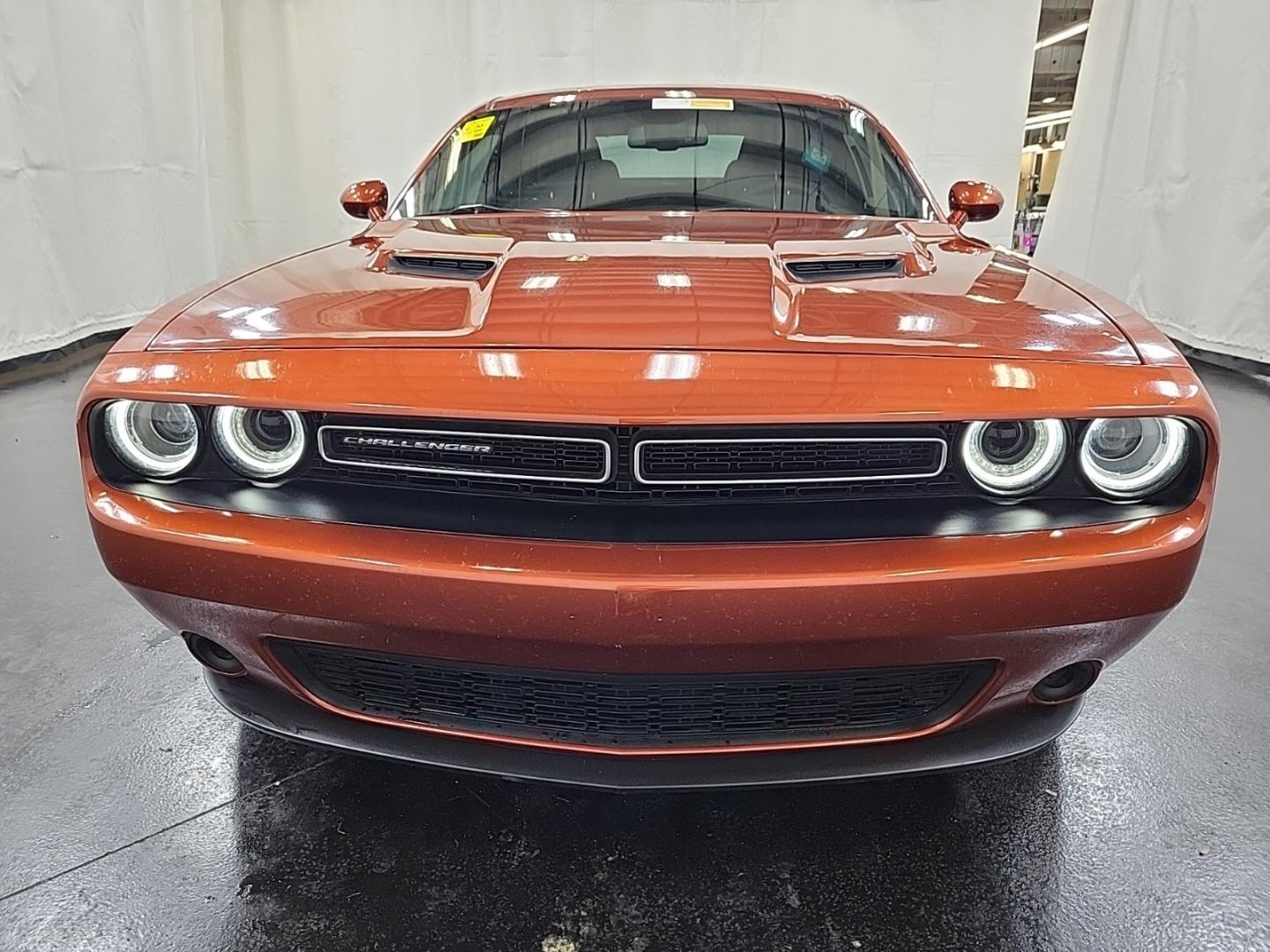 2021 Orange Dodge Challenger (2C3CDZAG2MH) , located at 2020 East Division Street, Arlington, TX, 76011, (817) 801-3191, 32.742390, -97.076874 - Come get behind the wheel of this Orange Dodge Challenger today! Come by now! Premiere Buy Here Pay Here with NO Credit Check (score) at 2020 East Division Street, Arlington, Texas, located in the center of the Dallas/Fort Worth metro area. For in-house financing in Lancaster, Waxahachie, Clebur - Photo#1