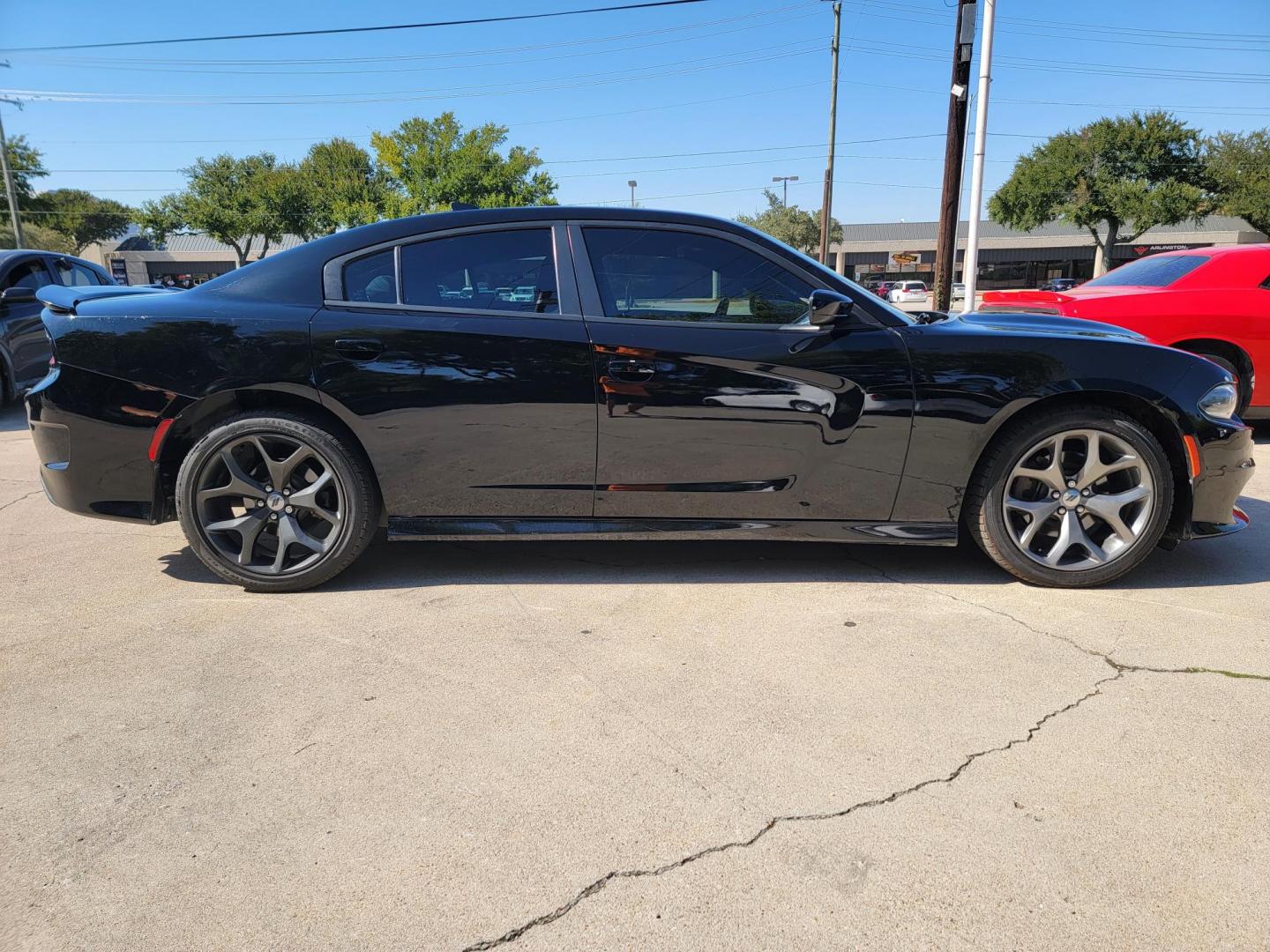 2019 Black Dodge Charger SXT Plus (2C3CDXHG8KH) with an 3.6L V6 DOHC 24V engine, 8A transmission, located at 2020 East Division Street, Arlington, TX, 76011, (817) 801-3191, 32.742390, -97.076874 - Photo#2