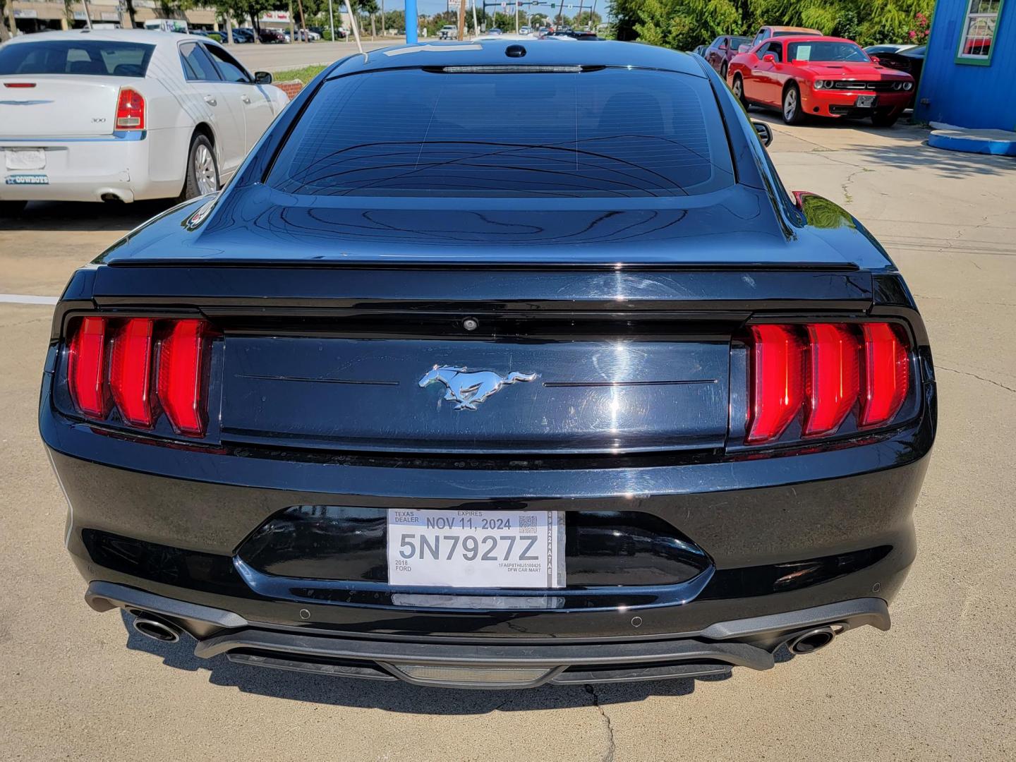 2018 Black Ford Mustang EcoBoost Coupe (1FA6P8TH8J5) with an 2.3L L4 DOHC 16V engine, located at 2020 East Division Street, Arlington, TX, 76011, (817) 801-3191, 32.742390, -97.076874 - Photo#5