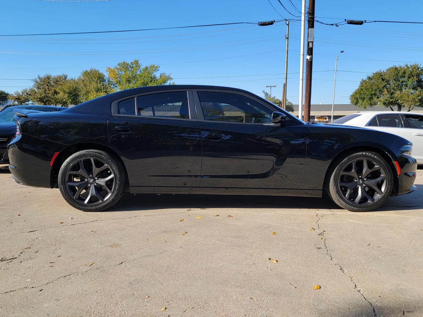 2020 Black Dodge Charger SXT (2C3CDXBG1LH) with an 3.6L V6 DOHC 24V engine, 8A transmission, located at 2020 East Division Street, Arlington, TX, 76011, (817) 801-3191, 32.742390, -97.076874 - Photo#2