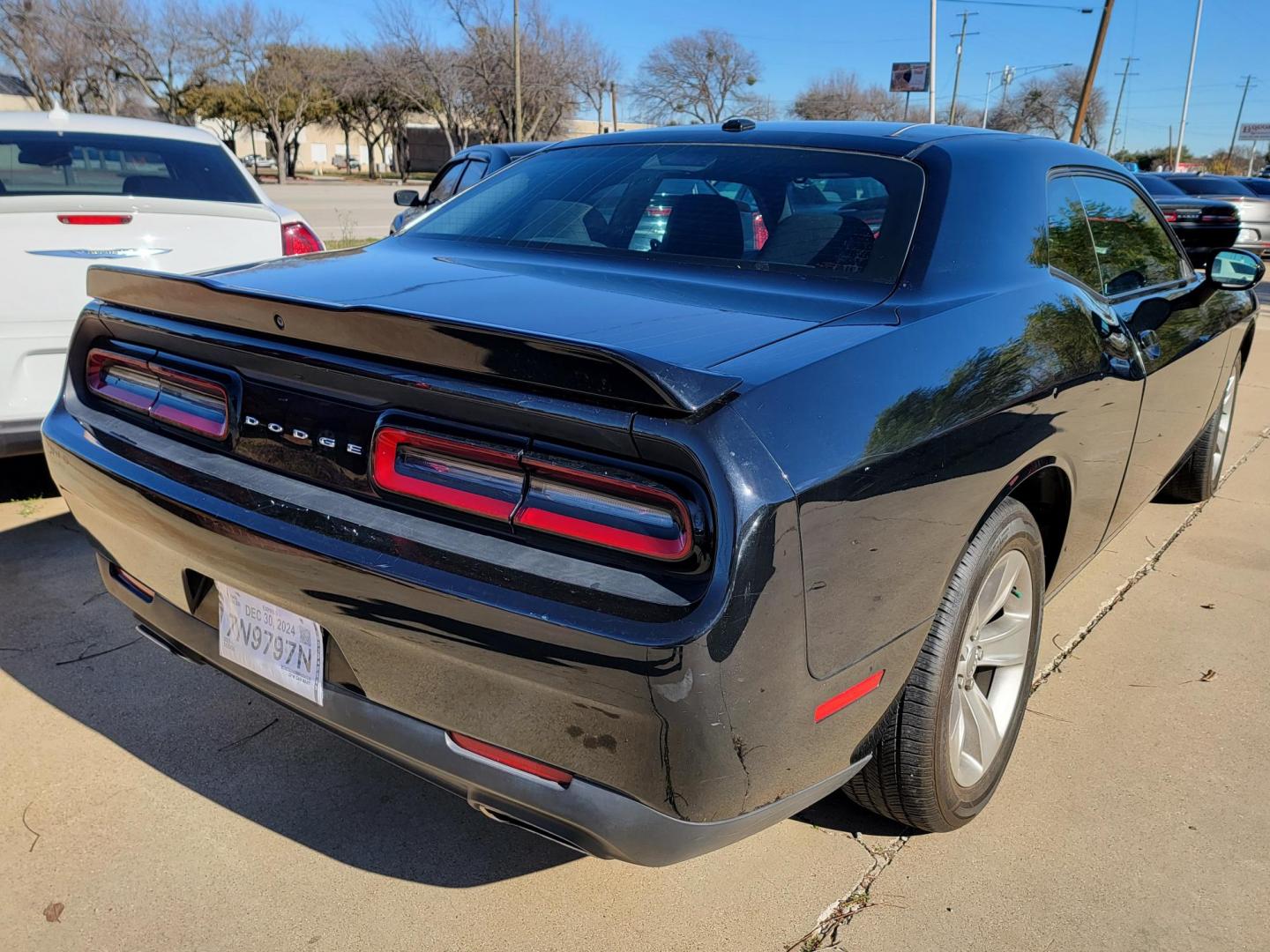 2021 Black Dodge Challenger SXT (2C3CDZAG9MH) with an 3.6L V6 DOHC 24V engine, 8A transmission, located at 2020 East Division Street, Arlington, TX, 76011, (817) 801-3191, 32.742390, -97.076874 - Photo#2