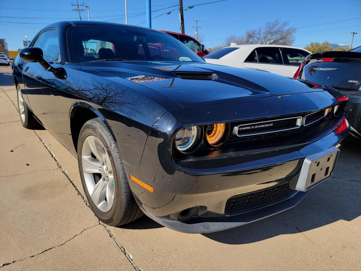 2021 Black Dodge Challenger SXT (2C3CDZAG9MH) with an 3.6L V6 DOHC 24V engine, 8A transmission, located at 2020 East Division Street, Arlington, TX, 76011, (817) 801-3191, 32.742390, -97.076874 - Photo#0