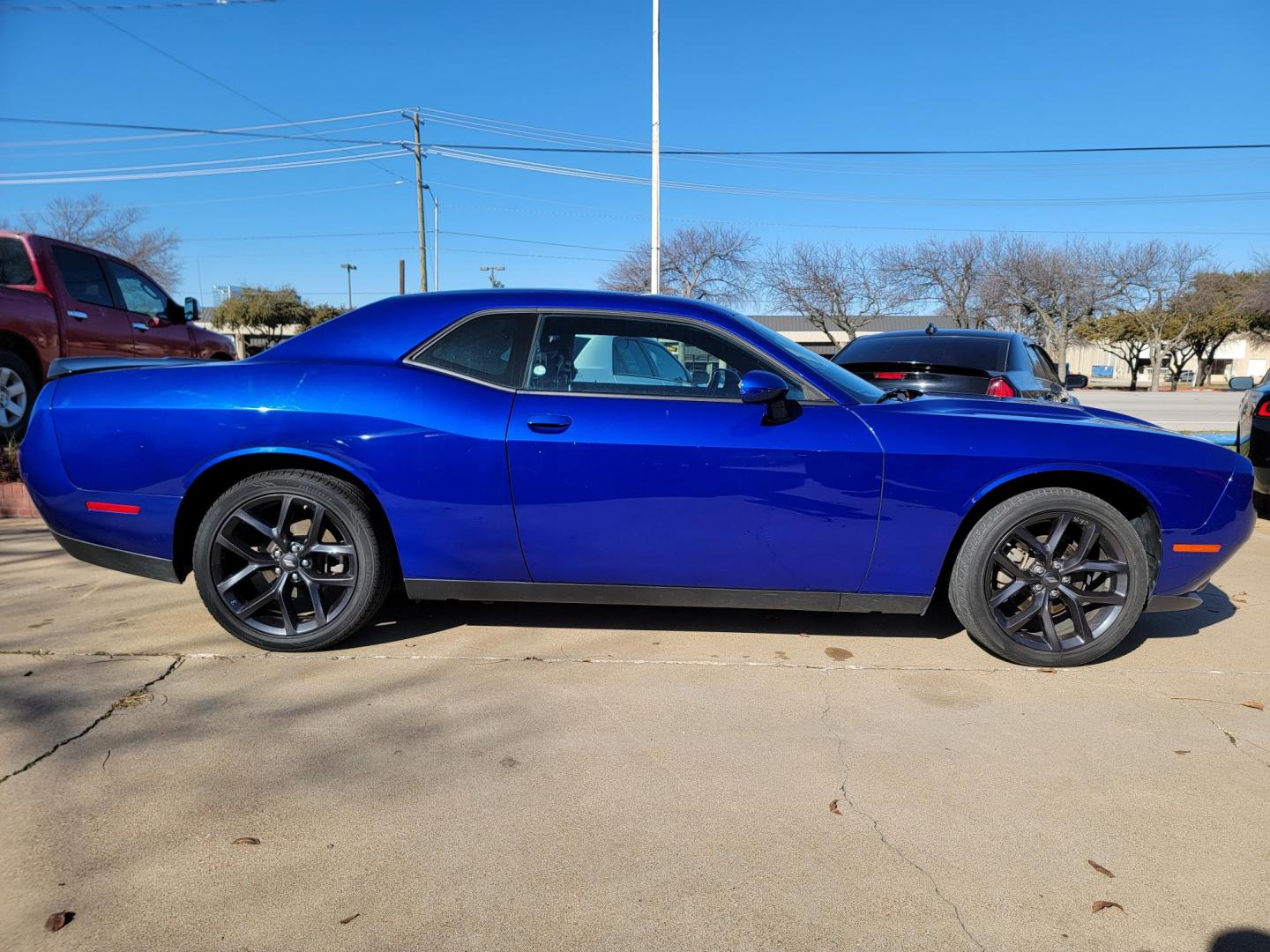 2022 Dodge Challenger SXT (2C3CDZAG5NH) with an 3.6L V6 DOHC 24V engine, 8A transmission, located at 2020 East Division Street, Arlington, TX, 76011, (817) 801-3191, 32.742390, -97.076874 - Photo#2