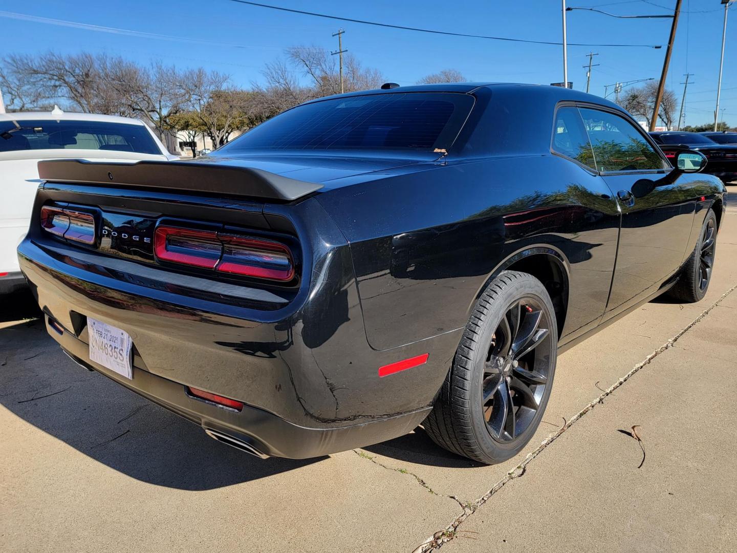 2018 Black Dodge Challenger SXT (2C3CDZAG9JH) with an 3.6L V6 DOHC 24V engine, 8A transmission, located at 2020 East Division Street, Arlington, TX, 76011, (817) 801-3191, 32.742390, -97.076874 - Photo#1