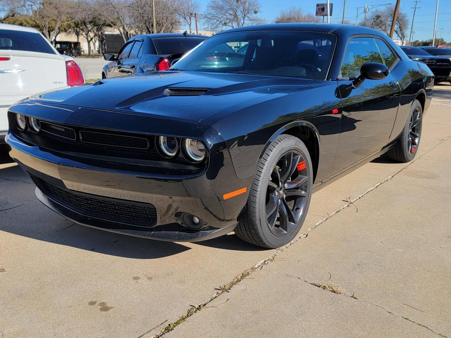 2018 Black Dodge Challenger SXT (2C3CDZAG9JH) with an 3.6L V6 DOHC 24V engine, 8A transmission, located at 2020 East Division Street, Arlington, TX, 76011, (817) 801-3191, 32.742390, -97.076874 - Photo#6